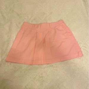 Pink pleated golf skirt